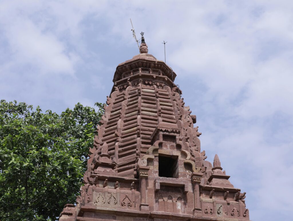 Ranthambore Ganesh Temple ancient architecture with stone carvings under cloudy sky