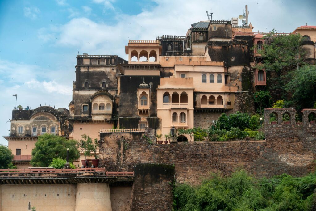 Historic buildings and walls of Lohagarh Fort Bharatpur with greenery and blue sky